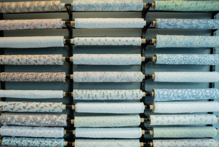 Printed linen fabric rolls on display